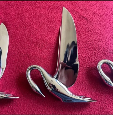 Original 1950s Packard swan hood ornaments.